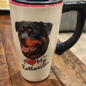 Tall " I love my rottweiler" coffee mug with lid.